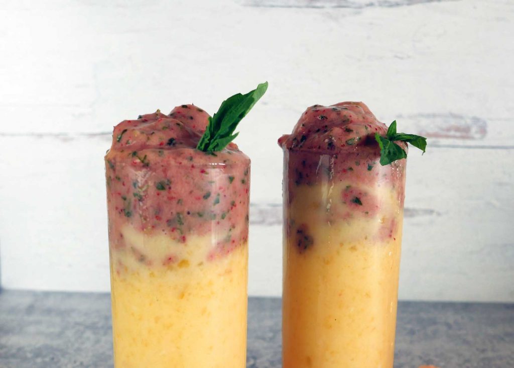 Strawberry basil smoothie with frozen peaches by Roaring Spork